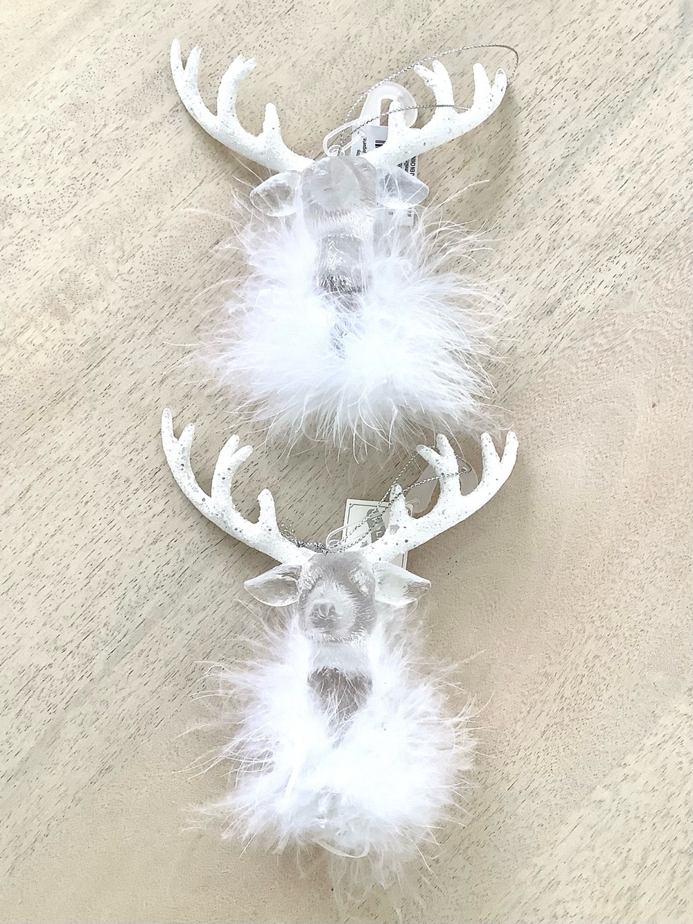 2 Deer Head Ornaments with Feather Collar
